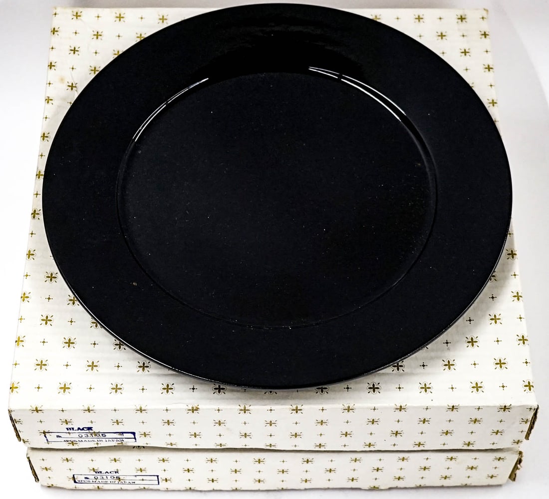 (7) Arita Black Service Plates or Chargers: (7) Arita Black Service Plates or Chargers. New in boxes, they measure 13 inches diameter. If lot is absent of a condition report one may be requested via email. Condition report is provided as an opi
