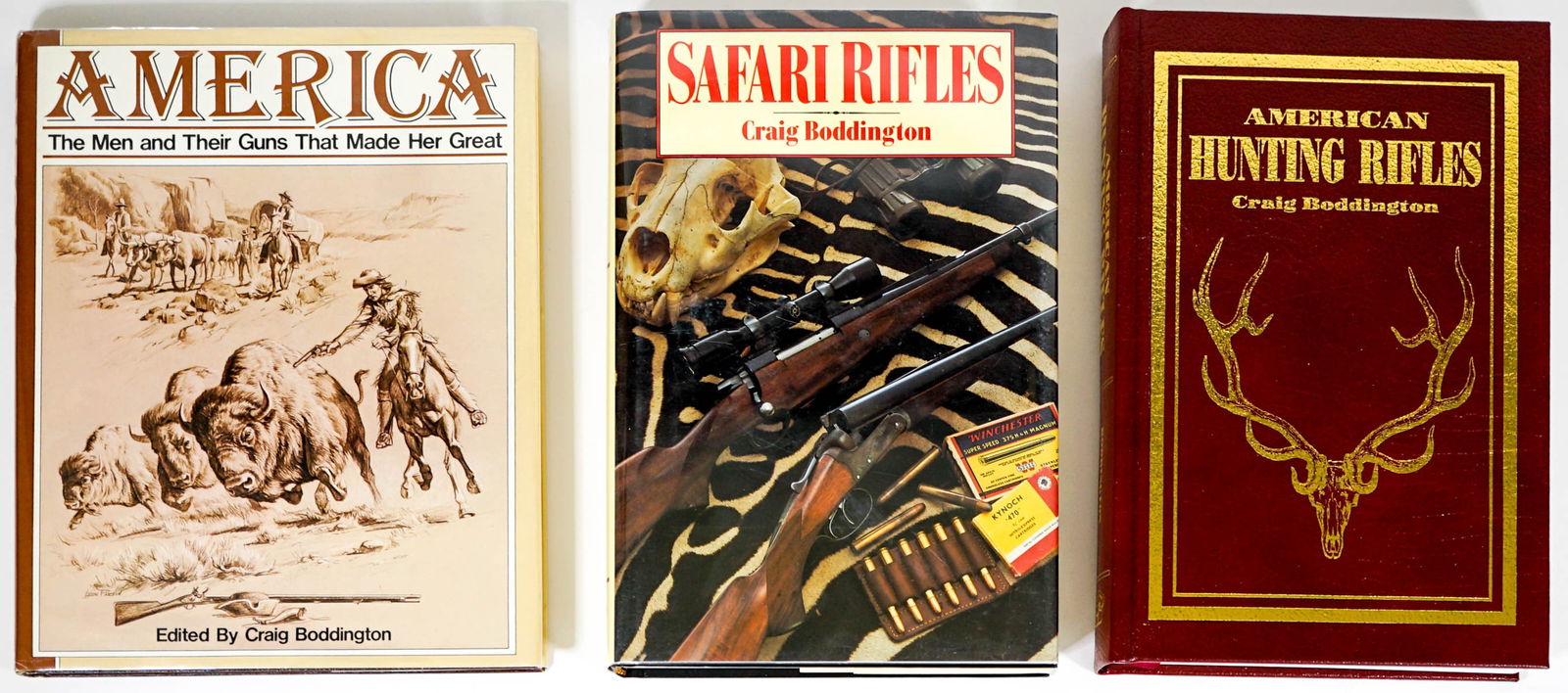 Craig Boddington (3) Firearm Books SIGNED: Three (3) Craig Boddington signed firearm books. Includes: 1) Safari Rifles with unclipped dust jacket. 2) America, The Men and Their Guns That Made Her Great with unclipped dust jacket. 3) American H