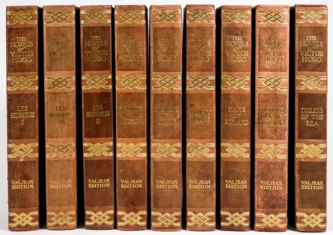 Victor Hugo (9) Valjean Edition Novels [Les Mis]: The Novels of Victor Hugo Valjean Edition. Set of nine (9). Includes Les Miserables I, II, and III, and more. Half leather with marbled covers. Gilt lettering and top edge. Warping to pages. Set measu