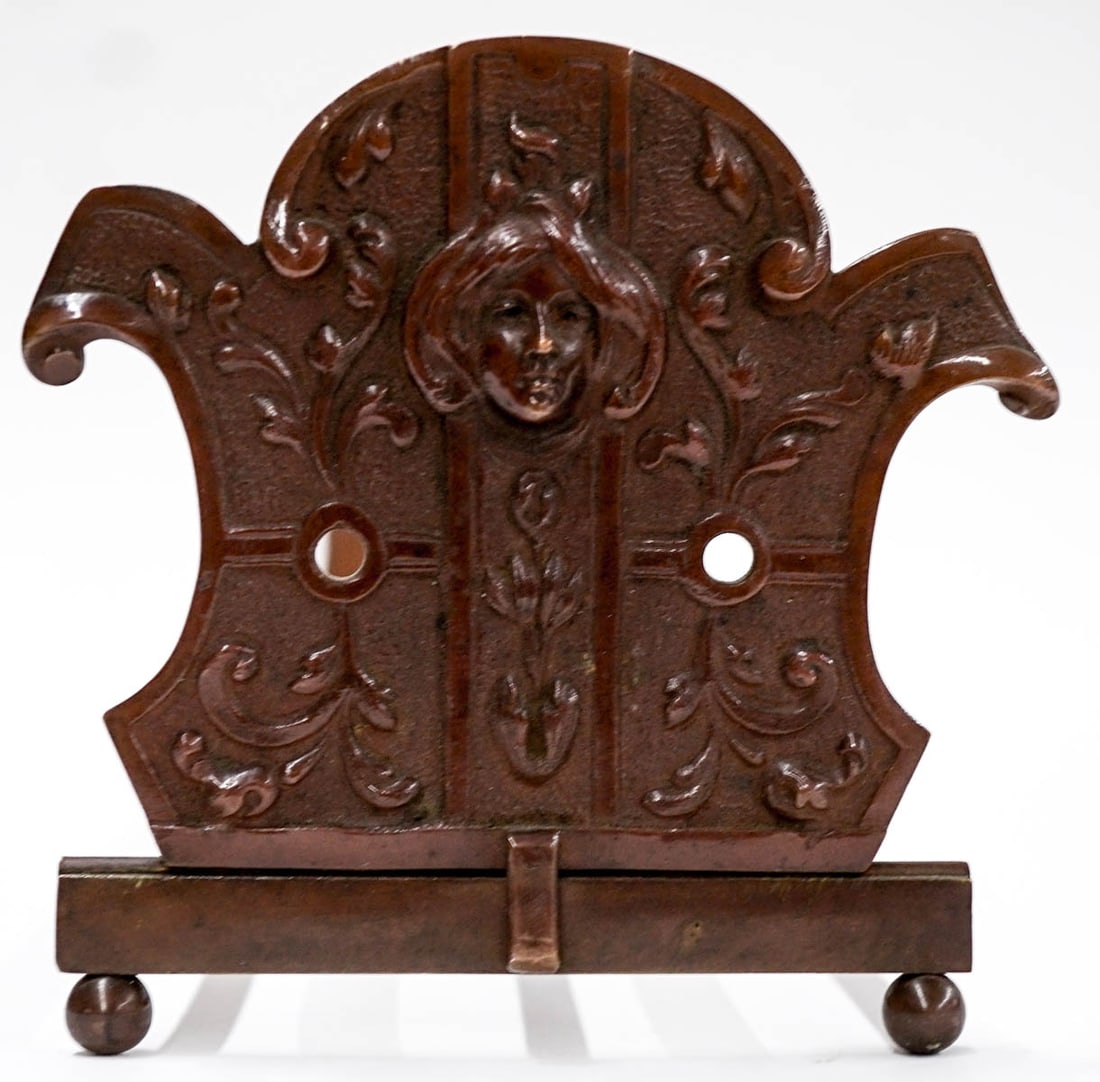 Art Nouveau Bronze Adjustable Bookends: Art Nouveau Bronze Adjustable Book Holder. Measures 12 x 4 x 4.5 inches. No damage. No cracks or chips, one glaze pop on base. If lot is absent of a condition report one may be requested via email. Co