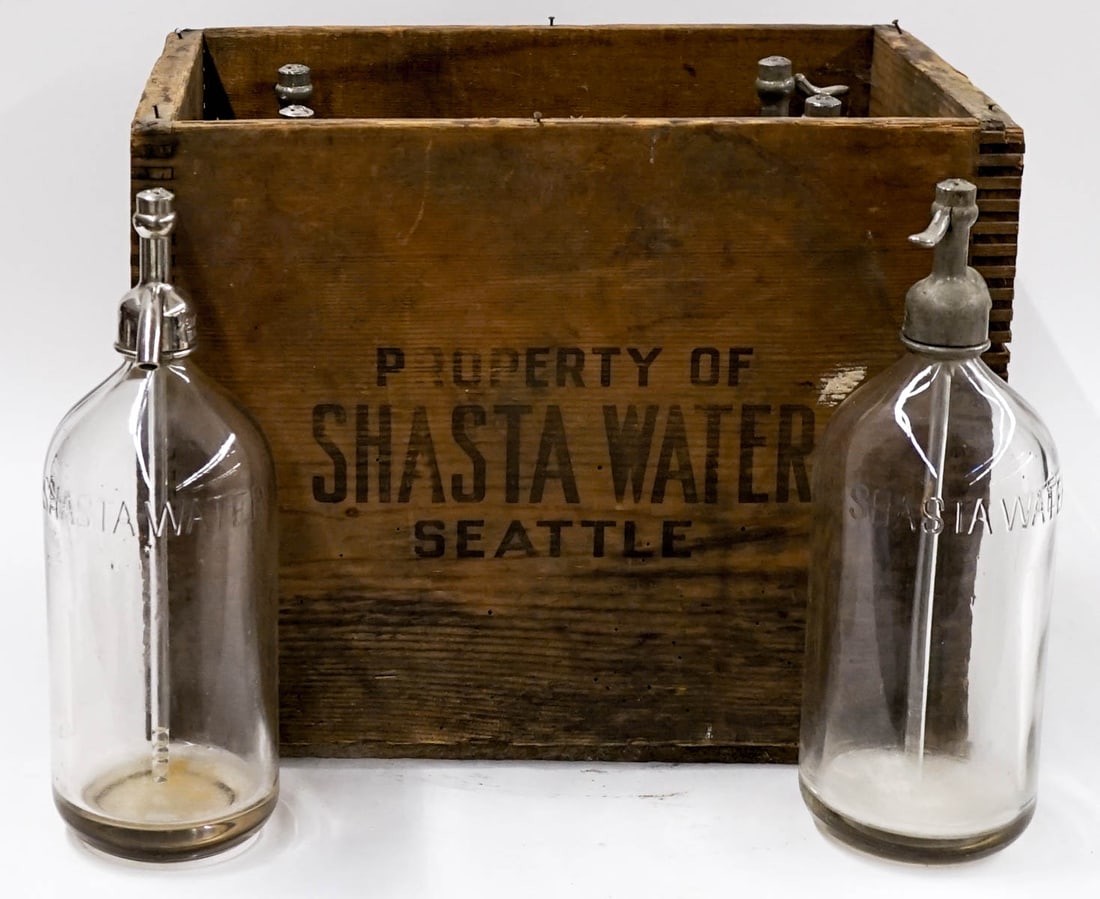 Shasta Water Bottles & Crate: Shasta Water Bottles (6) & Original Crate. No cracked or damaged bottles. This item requires the use of an outside shipper. If lot is absent of a condition report one may be requested via email. Condi