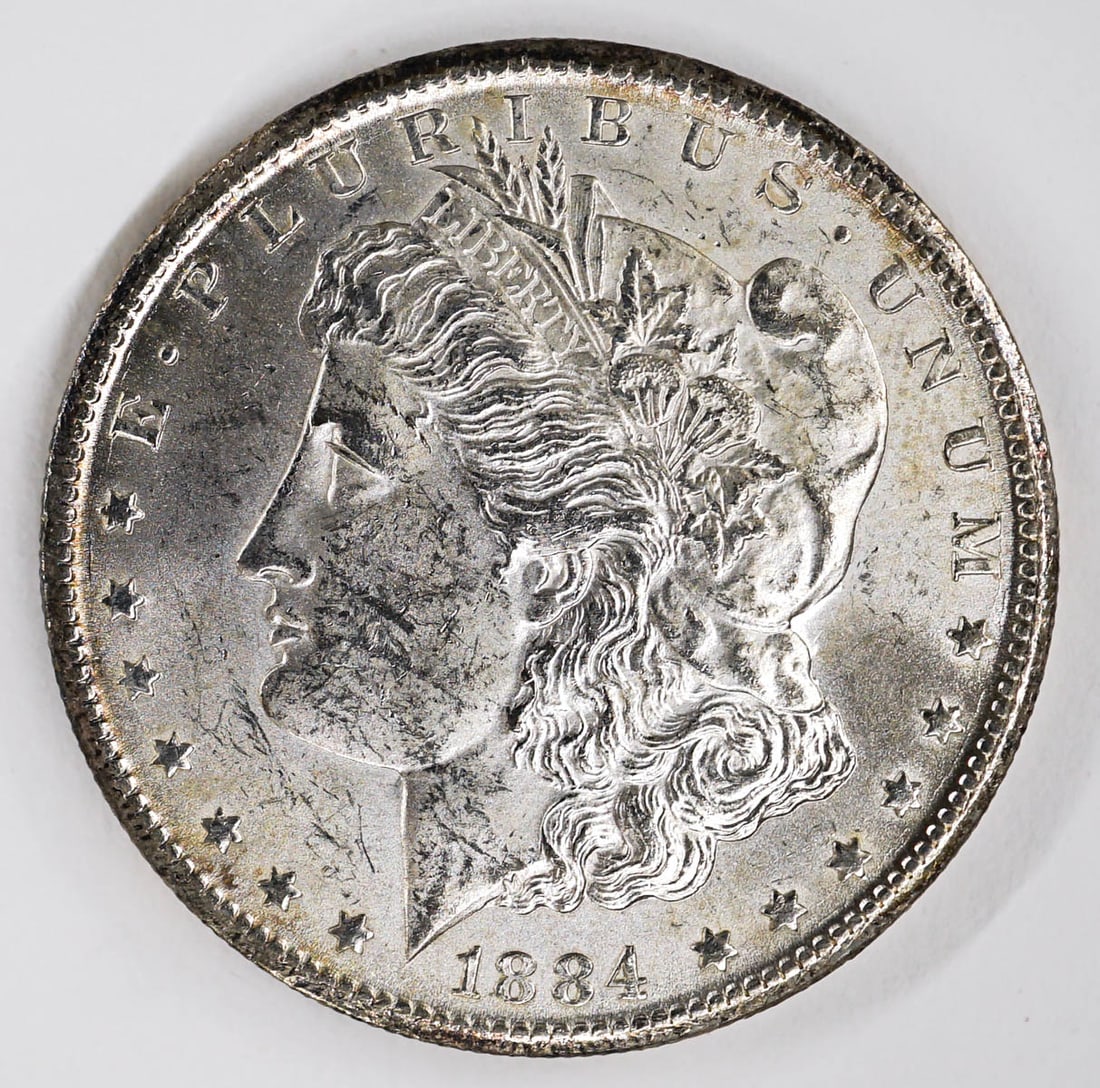 1884 CC Morgan Dollar: 1884 CC Morgan Dollar. This lot requires a Wire or Zelle transfer. If lot is absent of a condition report one may be requested via email. Condition report is provided as an opinion only and is no guar