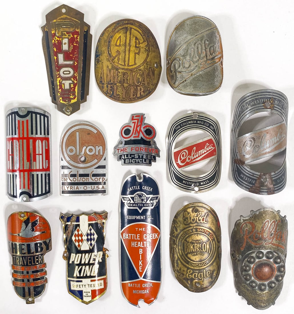 (13) Vintage Bicycle Head Badges: (13) Vintage Bicycle Head Badges. They measure 1.625 to 4 inches height. Mixed condition. If lot is absent of a condition report one may be requested via email. Condition report is provided as an opin