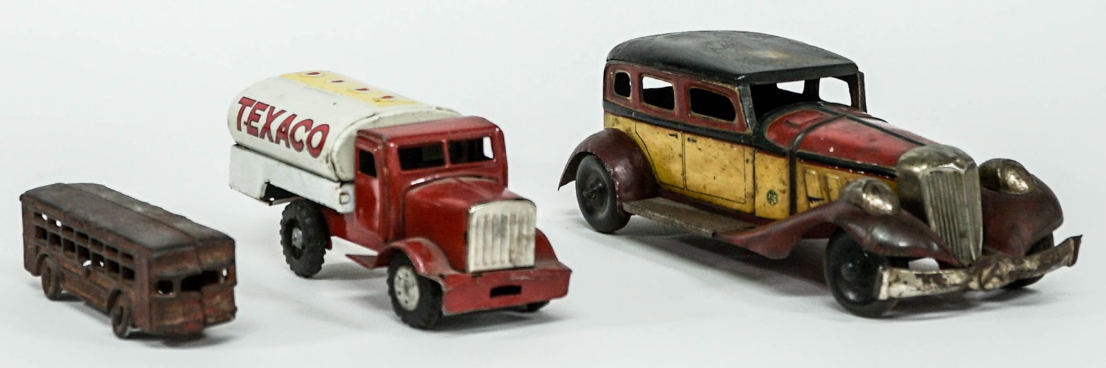 Toy (3) ETCR Wind-Up Car and More: Three (3) vintage transportation toys. Includes working wind-up 8.75 in. car with ETCR logo on side, 6.75 in. Texaco S-1149 tin tanker (friction winds but may need adjustment as it does not move well)