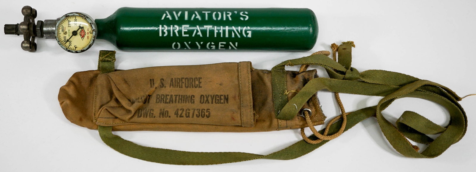 U. S. Airforce Pilots Bailout Breathing Oxygen: U. S. Airforce Bailout Breathing Oxygen Cylinder with canvas cover. Measures approximately 14 in. long. If lot is absent of a condition report one may be requested via email. Condition report is provi