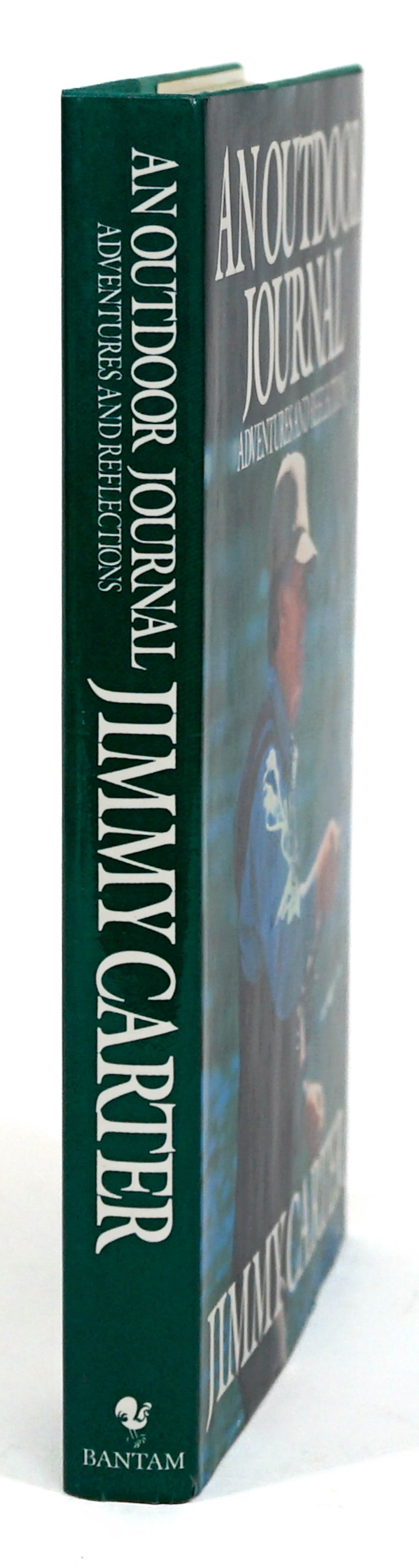 Jimmy Carter - Outdoor Journal SIGNED BAS COA: An Outdoor Journal by Jimmy Carter. Signed on half title page. Bantam Books. 1988 with unclipped dust jacket. 275 pp. Illustrated. Green two-tone covers. Measures 9.5 in. x 6.25 in. x 1 in. Beckett Au