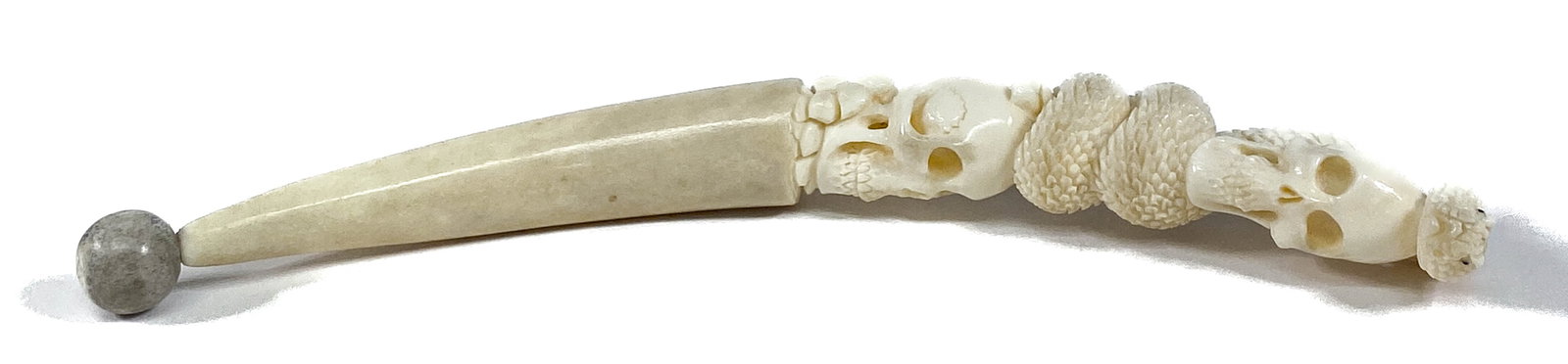 Native American Carved Bone Fetish Skull Snake: Native American Carved Bone Fetish Skull Snake. No damage. Measures 5.375 inches length. If lot is absent of a condition report one may be requested via email. Condition report is provided as an opini