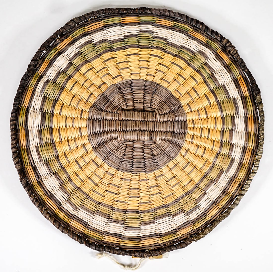 Josephine Lomatska Wicker Basket: Josephine Lomatska Wicker Basket. Measures 10.25 inches diameter. Very good condition. No signs of damage or repairs. If lot is absent of a condition report one may be requested via email. Condition r