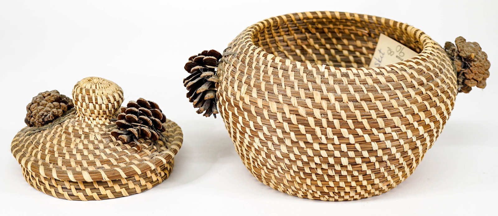 Darlene Robinson Coushatta Pine Needle Basket: Darlene Robinson Coushatta Pine Needle Basket. Measures 6 x 6 inches. Excellent condition, a little dusty. If lot is absent of a condition report one may be requested via email. Condition report is pr