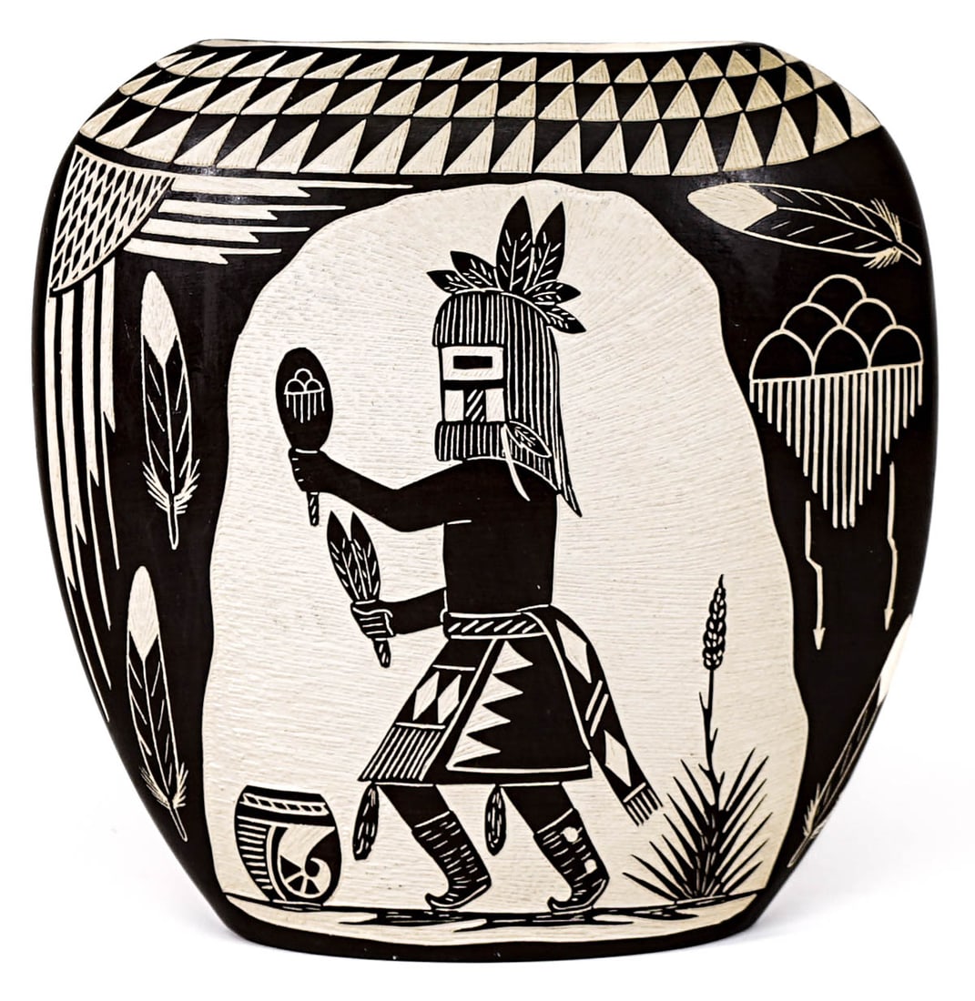A & V Lucario Native American Laguna NM 8IN Vase: A & V Lucario signed Native American Laguna New Mexico Kachina vase measures 8 in. tall x 8 in. wide x 3 in. deep. No evidence of cracks or repairs. If lot is absent of a condition report one may be r