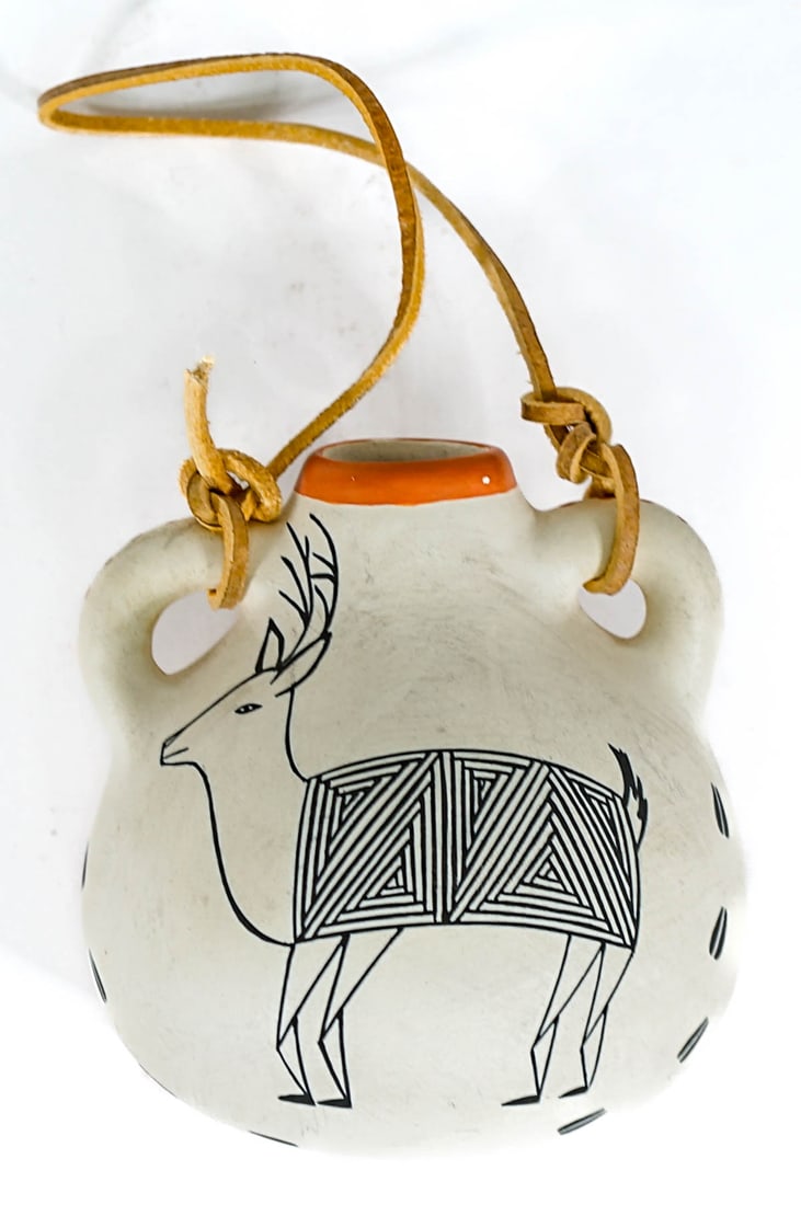 F.W. Acoma Pottery 4IN Jug [Deer]: F.W. signed Native American Acoma pottery jug (lays on side or hangs on wall) measures 4 in. x 4 in. x 3.25 in. No evidence of cracks or repairs. If lot is absent of a condition report one may be requ