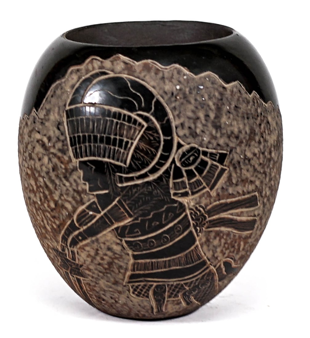 Dan Tafoya Santa Clara Etched 3.25IN [Ram Dancer]: Dan Tafoya signed Santa Clara Pueblo etched 'Ram Kachina Dancer' jar measures 3.25 in. tall x 3 in. wide x 1.875 in. across rim. No evidence of cracks or repairs. If lot is absent of a condition repor