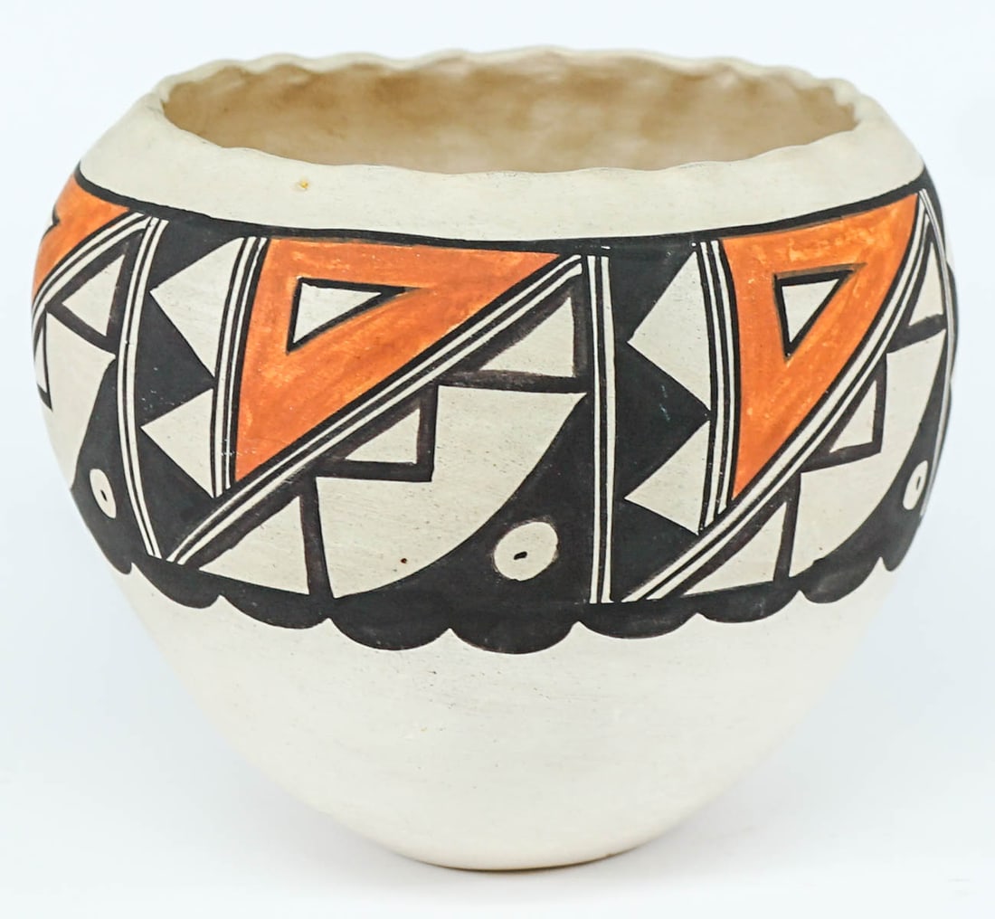 Acoma, New Mexico Polychrome 6IN Pot: Acoma New Mexico polychrome pot measures 6 in. x 7.25 in. x 5.25 in. across fluted rim. No evidence of cracks or repairs. If lot is absent of a condition report one may be requested via email. Conditi
