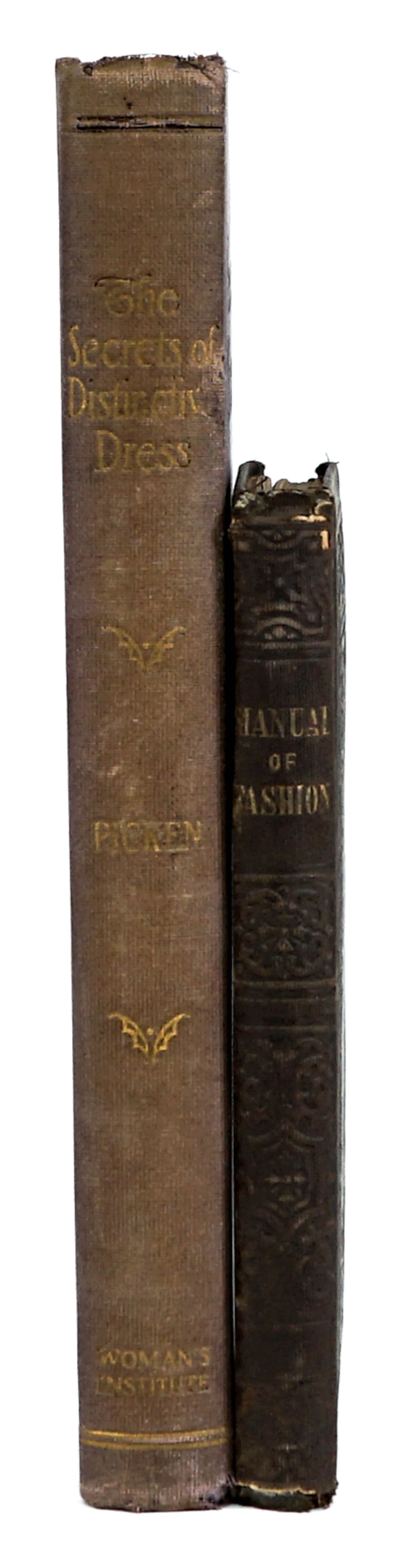 Antique (2) Books [Fashion, Elegance]: Two (2) Antique books of fashion. Includes: 1) The Secrets of Distinctive Dress by Mary Brooks Picken 1918. Measures 9 in. x 6 in. x 1 in. 2) The American Ladies and Gentleman's Manual of Elegance, Fa