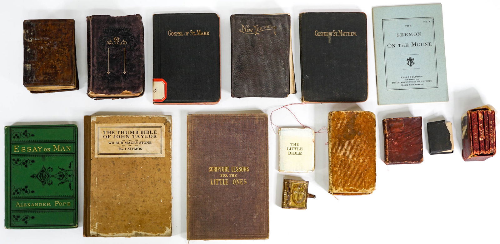 Religious (15) Small Books and Bibles: Fifteen (15) mini and small books include an antique Gospel set that measures 1.5 in. x 2.25 in. x 1.5 in. in slip case. Also included: The Thumb Bible of John Taylor, Essay on Man by Alexander Pope,