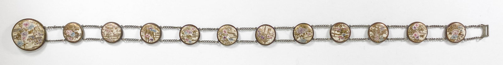 Satsuma Belt: Japanese Satsuma belt. The largest (buckle) measures 1.875 inches diameter (47 mm), other measure 1.25 inches diameter (33 mm). Total length is 27 inches (69 cm). No signs of damage or repairs. If lot
