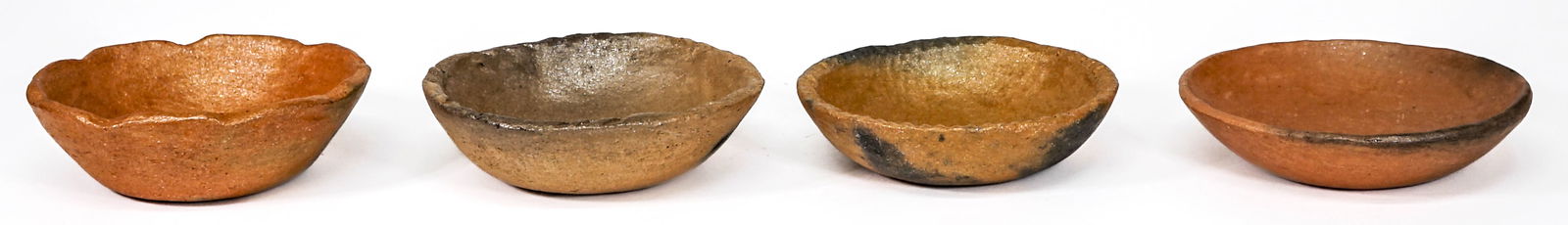 Four Pieces Picuris Micaceous Taos Small Bowls: Four Pieces Picuris Micaceous Taos Small Bowls. They measure 5.25-5.5 inches diameter. Excellent condition. No chips, cracks or repairs. Provenance: Estate collection Missoula, Montana. If lot is abse