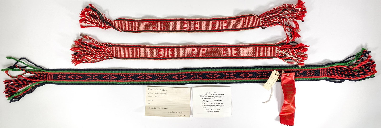 Viets Lomahaftewa (3) Woven Belts: Belts measure 30 in. and 51 in. long. Includes 2nd place ribbon from 1959 weavers contest. If lot is absent of a condition report one may be requested via email. Condition report is provided as an opi