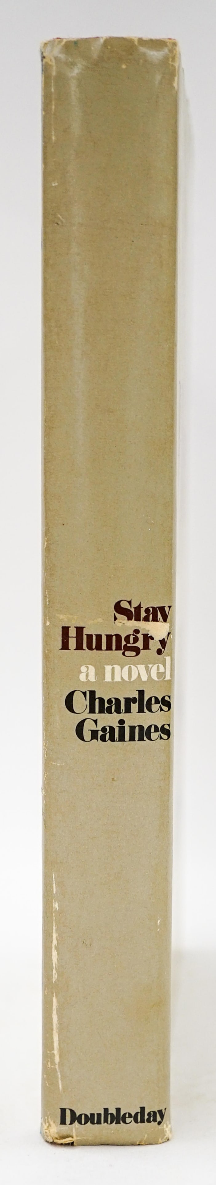 Stay Hungry - A Novel - Charles Gains -1st Edition: Stay Hungry - A Novel - Charles Gains -1st Edition book. There are NO library book card pockets affixed unless photographed and/or disclosed otherwise. Many simply have a BSC bookplate inside front co