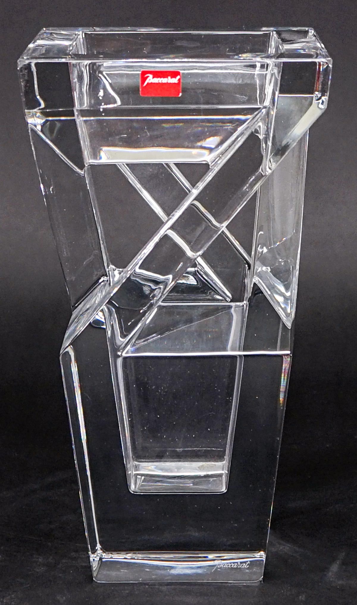 Baccarat Architect Vase 2100388 w/ Original Box: Baccarat Architect Vase Made in France. #2100388 Measures 9.5 in. tall. No evident cracks or repair. If lot is absent of a condition report one may be requested via email. Condition report is provided