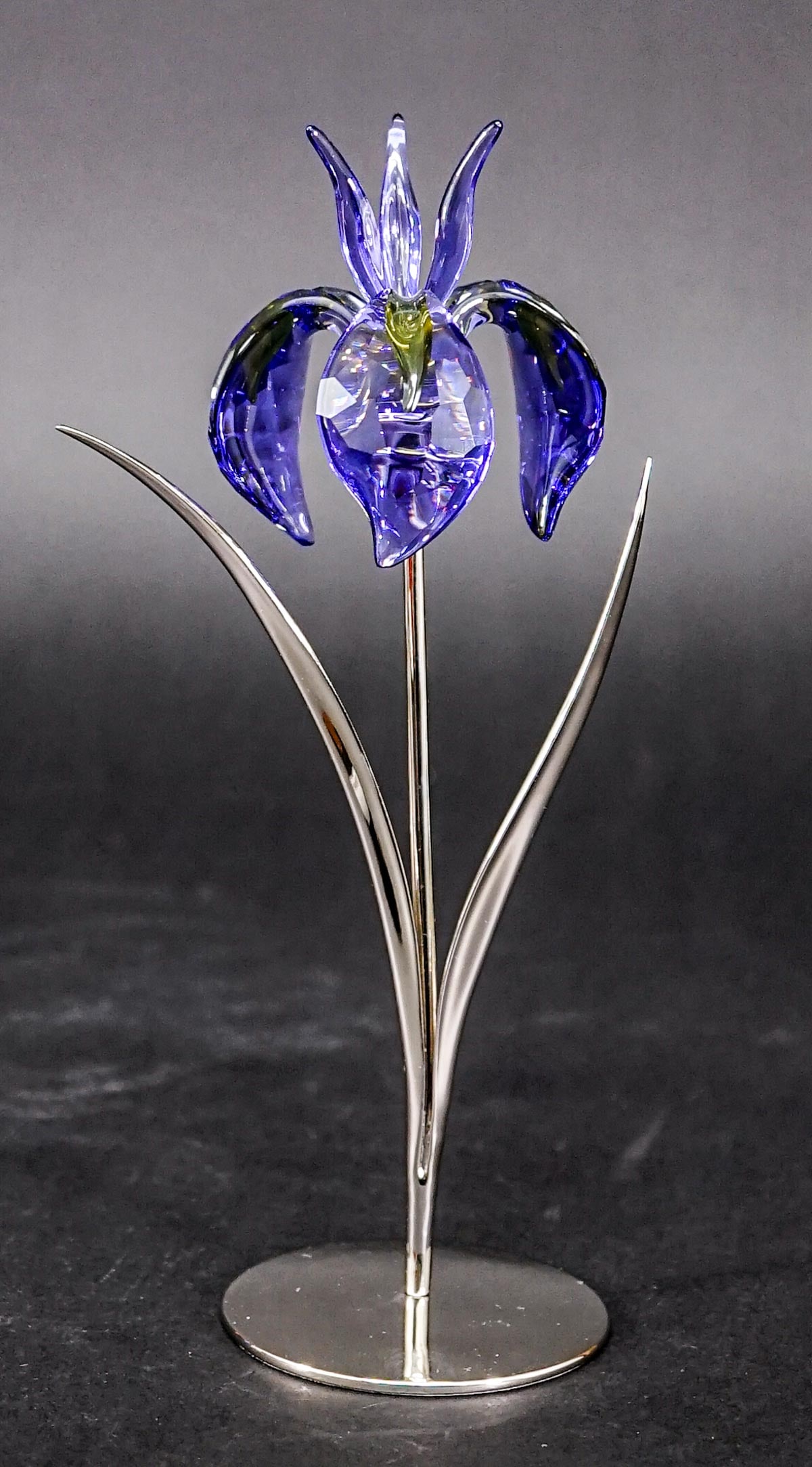 Swarovski Crystal 8 IN Damboa Blue Violet: Swarovski crystal Made in Austria measures 8 in. tall. No evident cracks or repair. If lot is absent of a condition report one may be requested via email. Condition report is provided as an opinion on