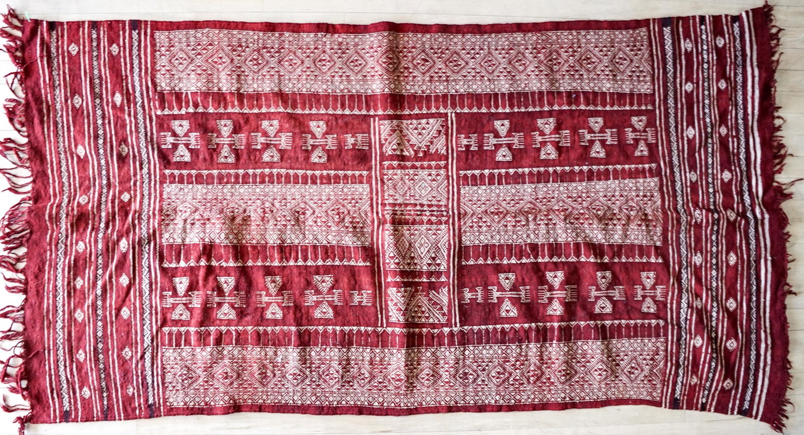Tunisian Berber Baknoug Woven Wool Flatweave: Tunisian Berber Baknoug Woven Wool Flatweave. Measures 6 feet 5 inches x 3 feet 5 inches. Of Soumak-type reverse. If lot is absent of a condition report one may be requested via email. Condition repor