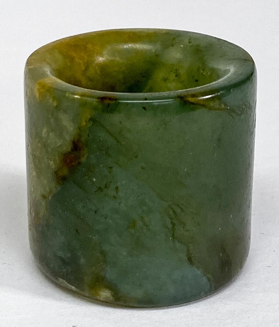 Chinese Jade Archers Ring: Chinese Jade Archers Ring (large). Measures 1.9375 x 1.5 inches (36 x 38 mm), weighs 65 grams. Ring size 14. No damage. Provenance: Spokane, Washington estate collection. If lot is absent of a conditi