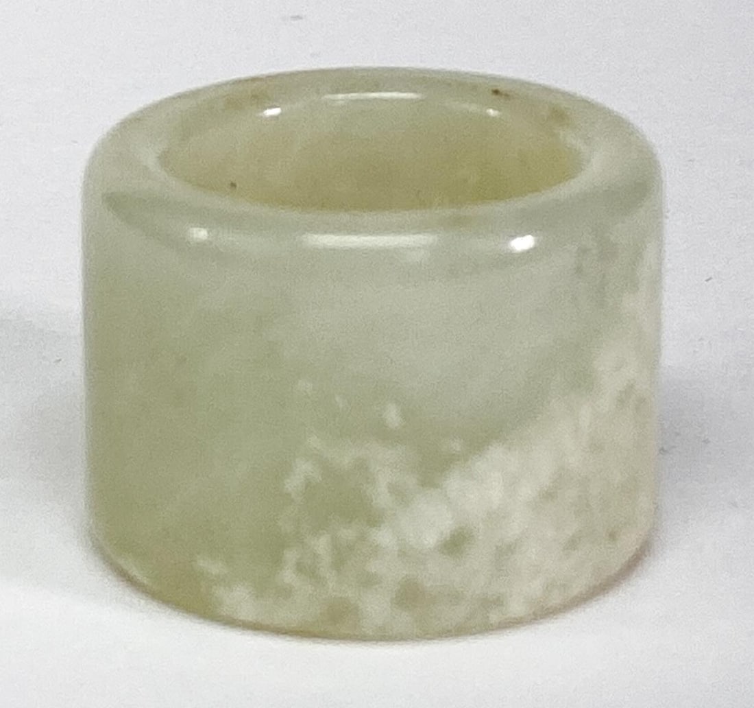 Chinese Jade Archers Ring: Chinese Jade Archers Ring. Measures .8125 x 1.125 inches (21 x 30 mm), weighs 20 grams. Ring size 10. No damage. Provenance: Spokane, Washington estate collection. If lot is absent of a condition repo