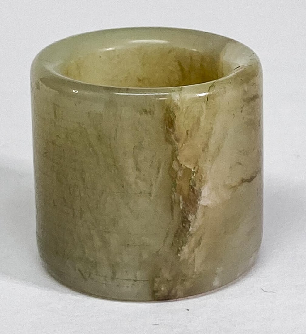 Chinese Jade Archers Ring: Chinese Jade Archers Ring. Measures 1.0625 x 1.125 inches (27 x 29 mm), weighs 24 grams. Ring size 9.5. No damage. Provenance: Spokane, Washington estate collection. If lot is absent of a condition re