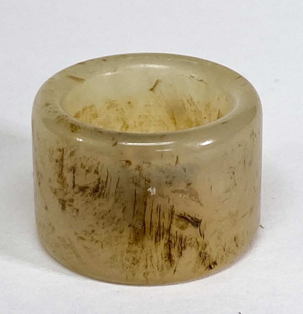 Chinese Jade Archers Ring: Chinese Jade Archers Ring. Measures .75 x 1.125 inches (19 x 29 mm), weighs 16 grams. Ring size 10. No damage. Provenance: Spokane, Washington estate collection. If lot is absent of a condition report