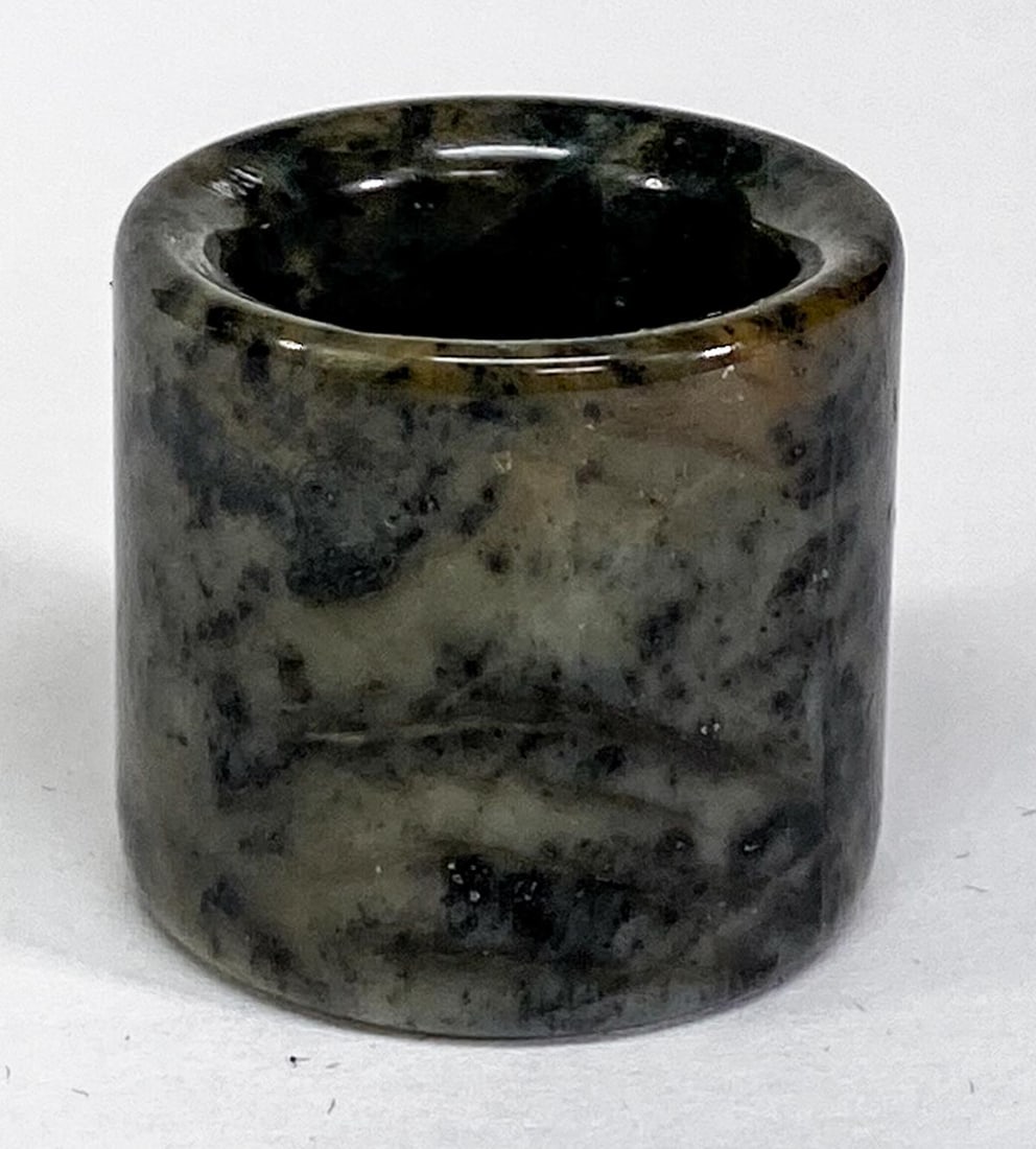 Chinese Jade Archers Ring: Chinese Jade Archers Ring. Measures 1 x 1.25 inches (26 x 29 mm), weighs 23 grams. Ring size 9.5. No damage. Provenance: Spokane, Washington estate collection. If lot is absent of a condition report o