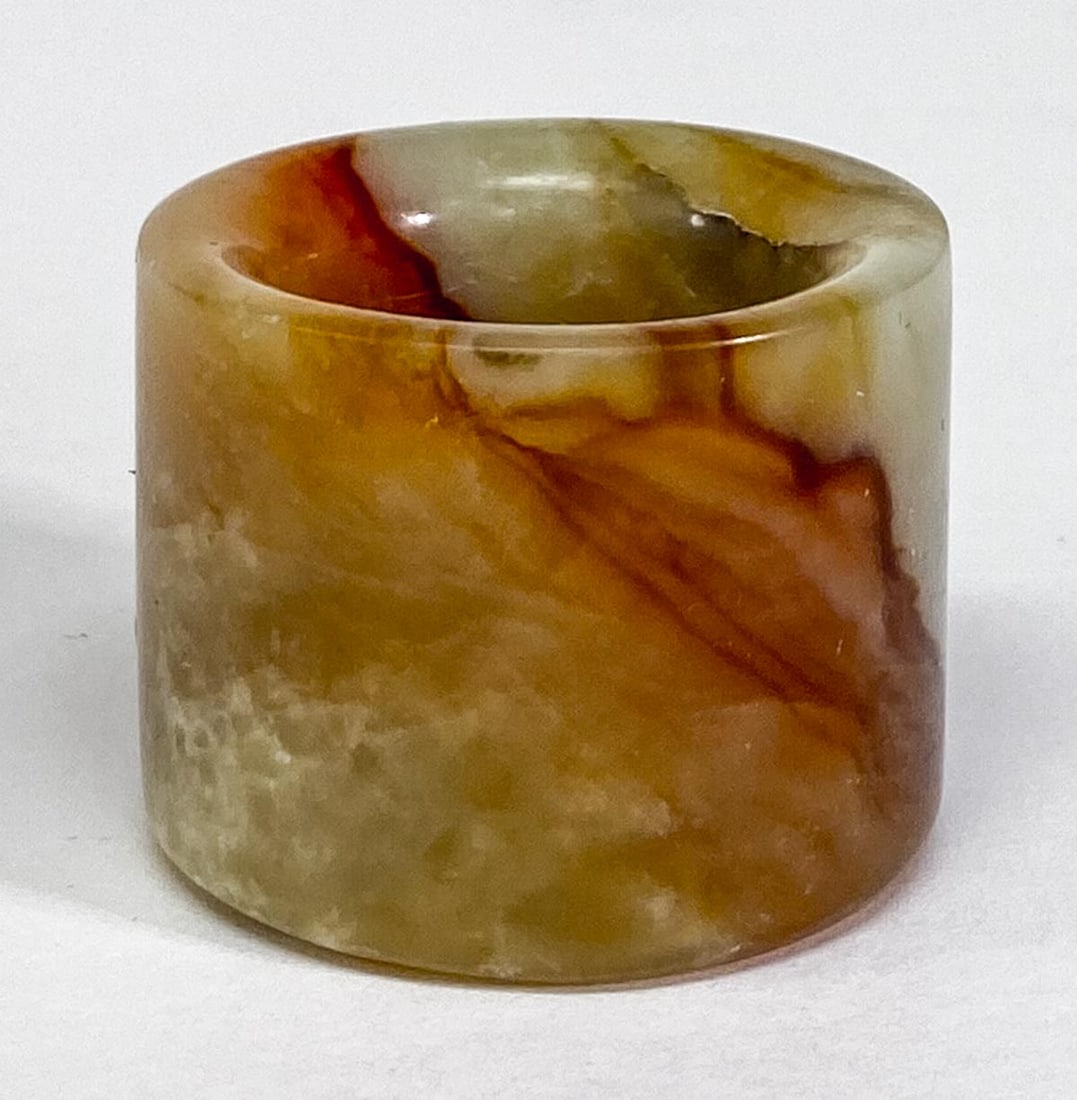 Chinese Jade Archers Ring: Chinese Jade Archers Ring. Measures 1.0625 x 1.625 inches (27 x 36 mm), weighs 39 grams. Ring size 13.5 No damage. Provenance: Spokane, Washington estate collection. If lot is absent of a condition re