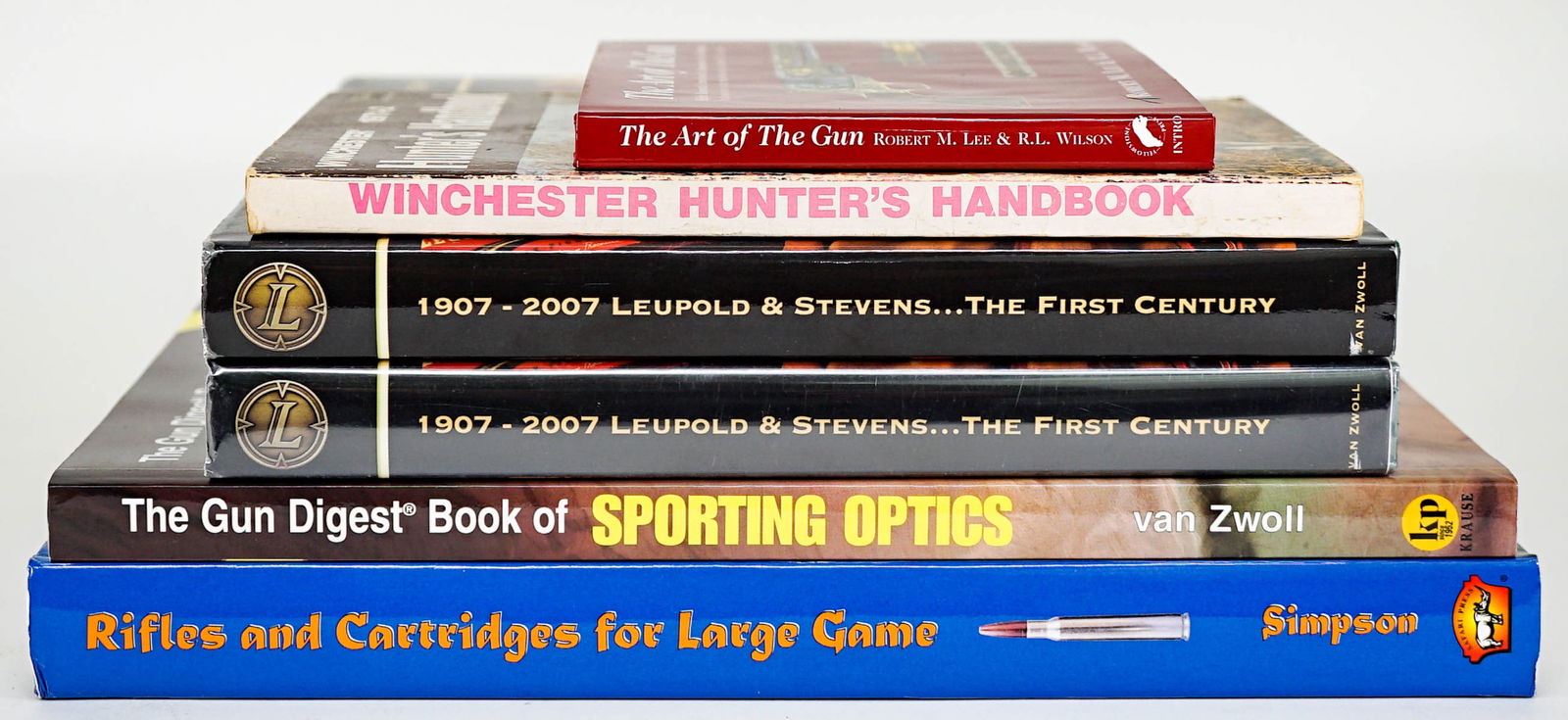 Firearm (6) Books [Van Zwoll SIGNED]: Six (6) books include 1) Two (2) copies of Leupold and Stevens... The First Century 1907-2007 by Wane Van Zwoll. Primedia Outdoors. 2007. One (1) is author inscribed and signed. 2) Rifles and Cartridg
