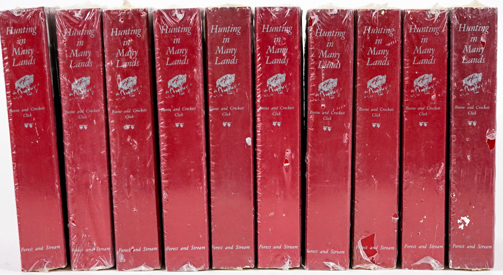 Boone and Crockett Club (10) Facsimile SEALED: Hunting in Many Lands. Ten (10) Boone and Crockett Club facsimile reprint softcover books. PUBLISHER SEALED. Theodore Roosevelt and George Bird Grinnell Editors. 1986. Lot measures 8.25 in. x 5.5 in. 