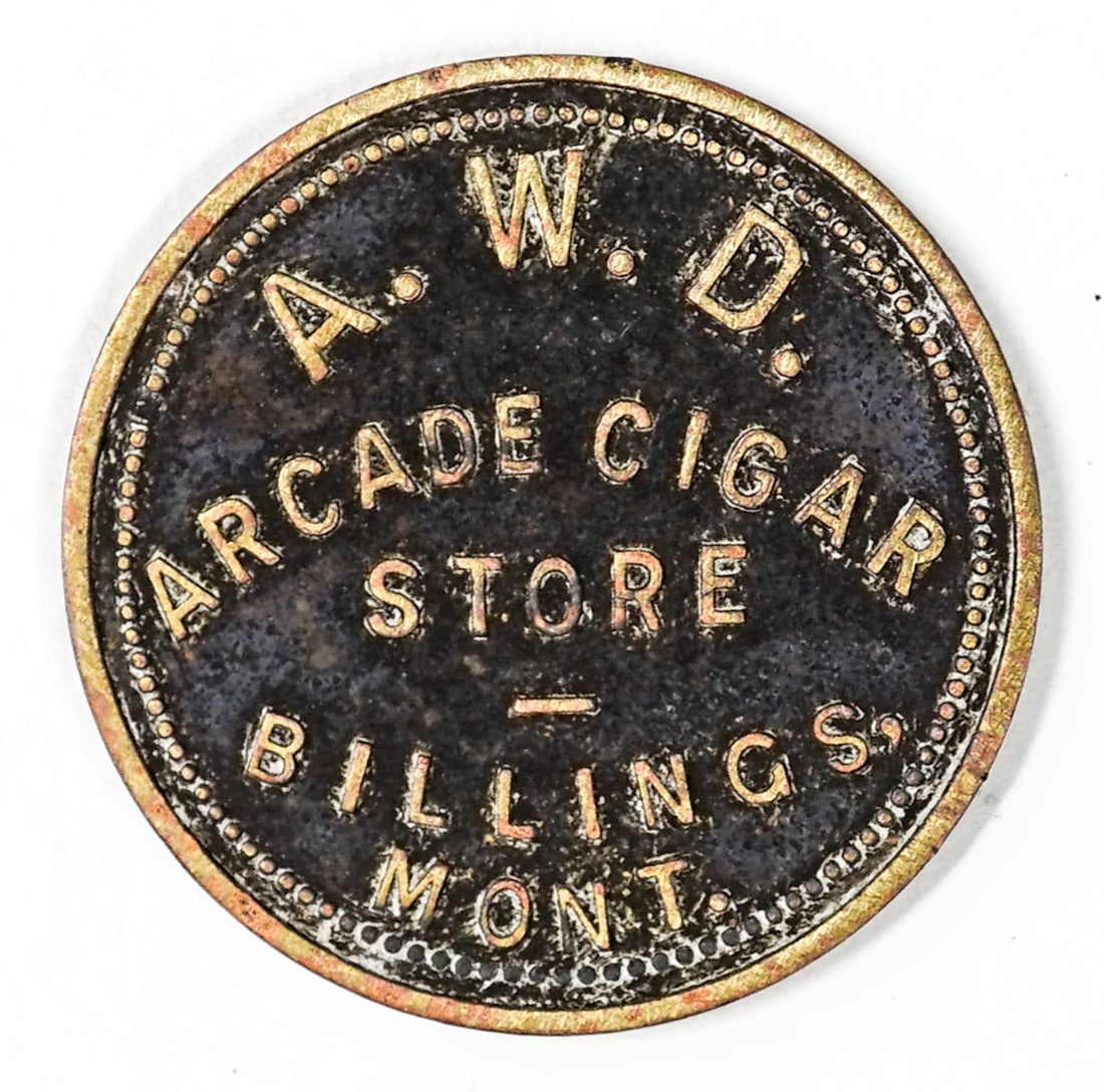 Arcade Cigar Store Billings, Montana Token: A.W.D. Arcade Cigar Store Billings, Montana Token. Good for 25c in Trade. VG-EX/EX condition. Measures 28 mm. If lot is absent of a condition report one may be requested via email. Condition report is
