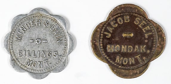 (2) Old Montana Trade Tokens