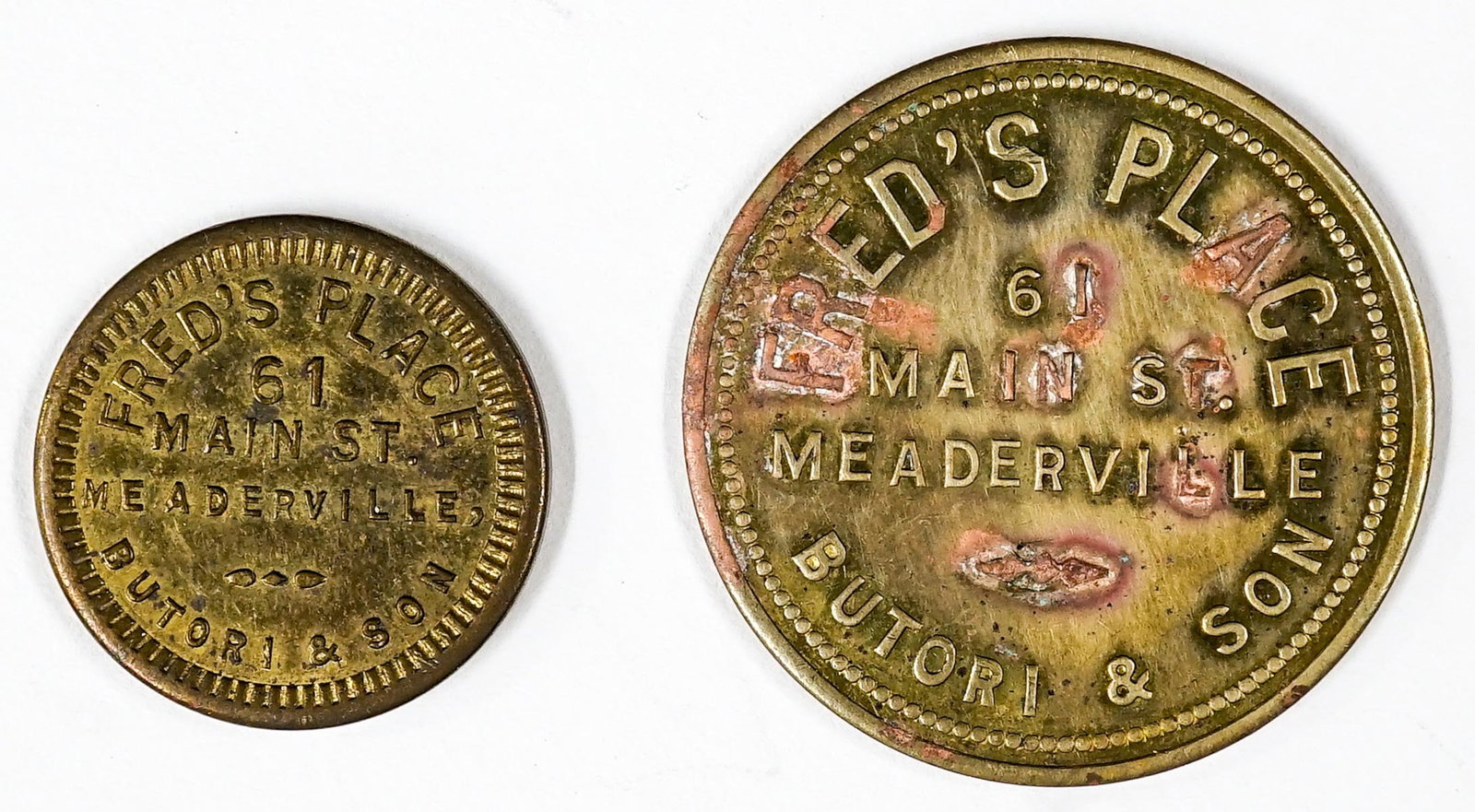 Fred's Place Meaderville, Montana 5c & $1 Tokens: (2) Fred's Place Meaderville, Montana Tokens, Good For 5c and $1 in Trade. They measure 20 mm and 30 mm. If lot is absent of a condition report one may be requested via email. Condition report is prov