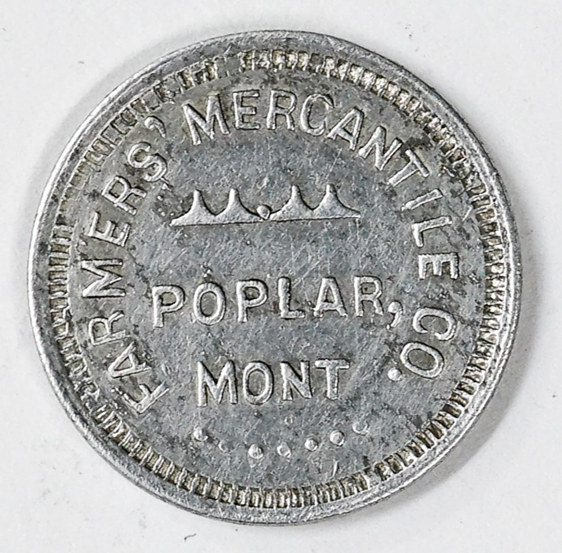 Farmers' Mercantile Poplar, Montana Token: Farmers' Mercantile Poplar, Montana Token. Good for 10c in Trade. VG-EX/EX condition. Measures 21 mm. If lot is absent of a condition report one may be requested via email. Condition report is provide