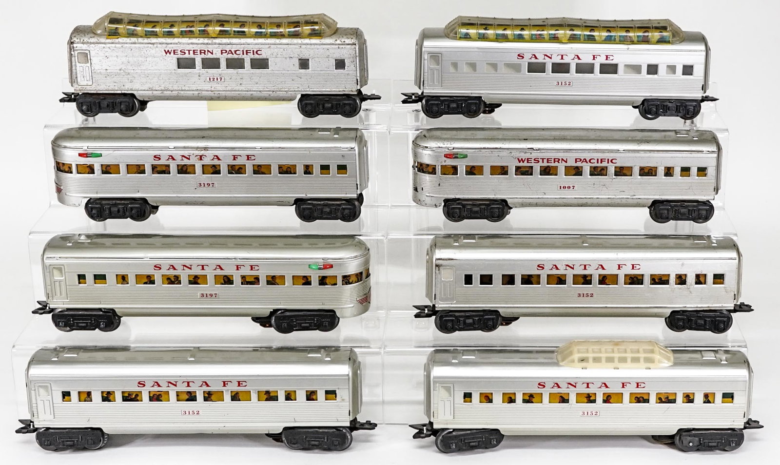 Western Pacific, Santa Fe (8) Metal Cars: Western Pacific and Santa Fe metal cars, toy trains include: Western Pacific 1007 and 1217; Santa Fe 3152 and 3197. If lot is absent of a condition report one may be requested via email. Condition rep