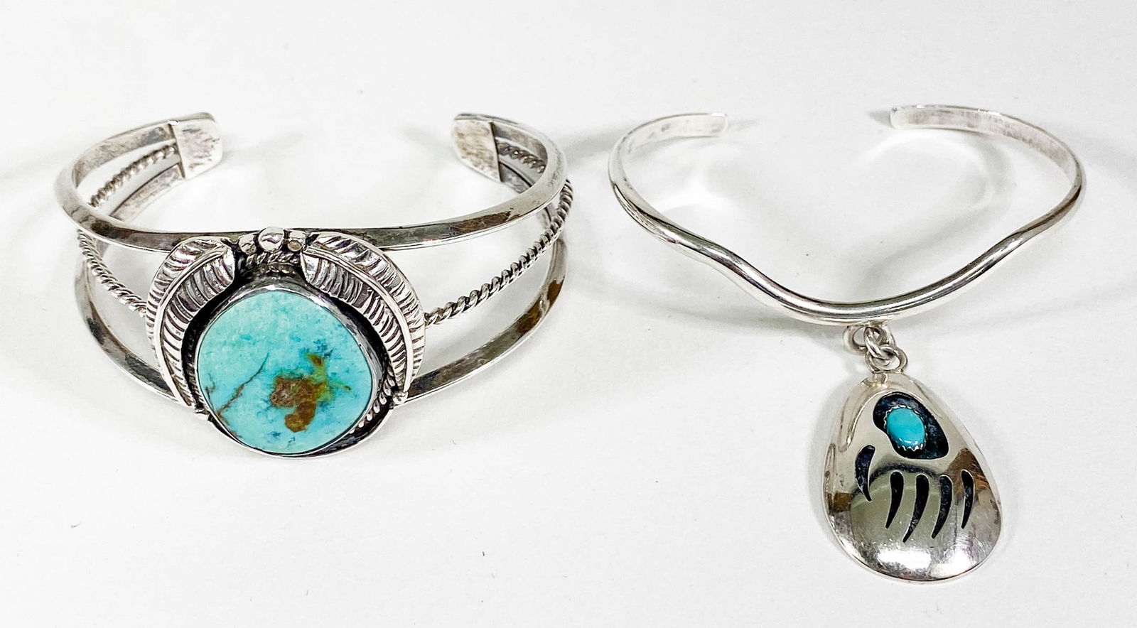 S. Joe & Thomas Nez Navajo Silver/Turquoise: S. Joe and Thomas Nez Signed Navajo Turquoise Cuff Bracelets. Top, or head of the bracelet, measures 1.25 x 2.375 inches x 2 inches in height and 1 inch x .5 inches x 1.75 . Inside circumference measu