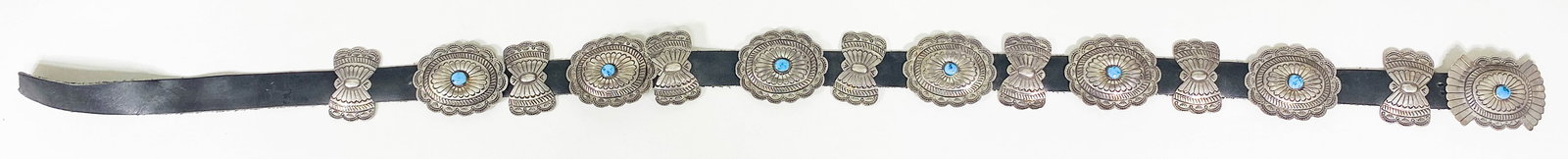 J. Blackgoat Sterling Concho Belt: Very nice Sterling Silver Hand Stamped J. Blackgoat Concho Belt with Castle Dome Arizona Mine Turquoise. 32 inches Long Total of 7 Conchos including Buckle Oval. Conchos are 2 X 2.625 inches. Butterfl