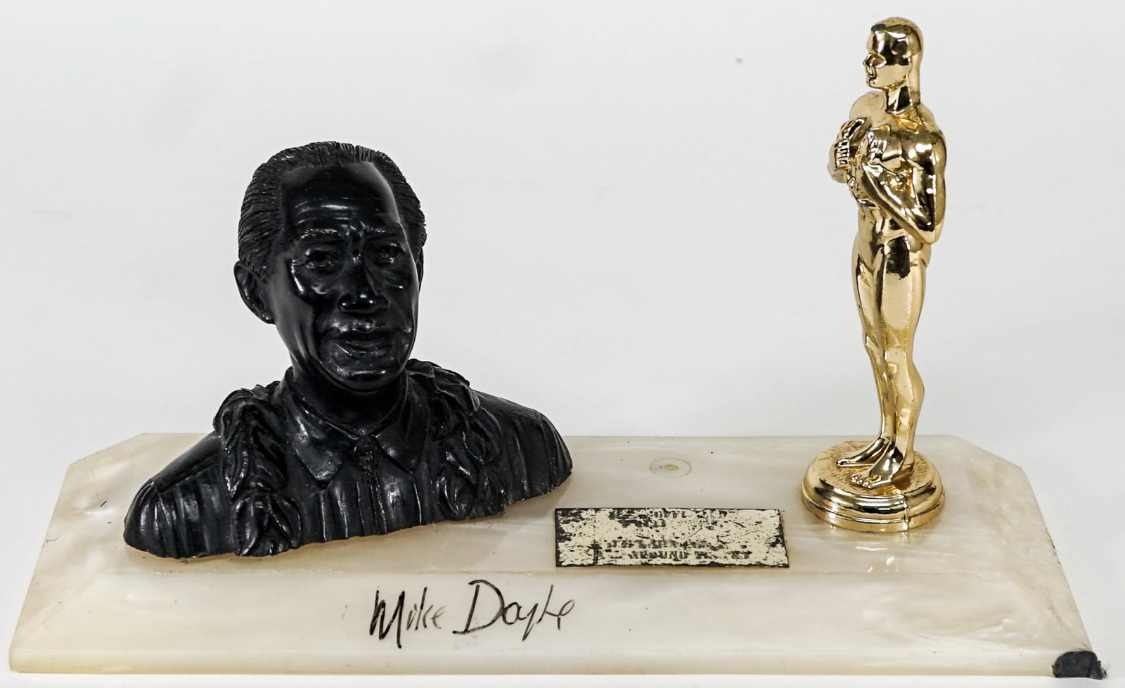 1965 Duke Kahanamoku All-Around Trophy: 1965 Duke Kahanamoku All-Around Trophy (U.S. Surfboard Championships). Measures 4.75 x 11.5 x 4 inches. Appears to be missing one ornament. If lot is absent of a condition report one may be requested 