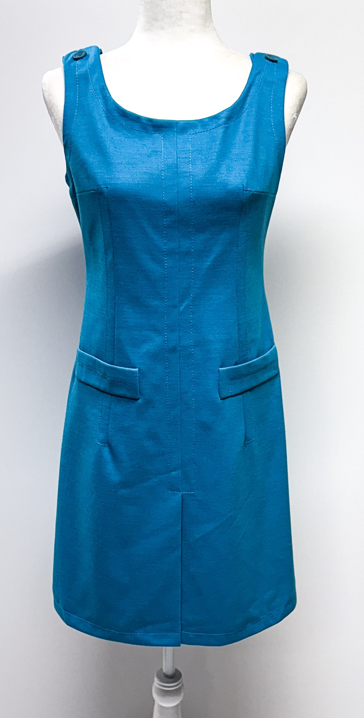 Braniff Airways - Emilio Pucci Hostess Uniform: Braniff International Airways 3 pc hostess uniform in blue print designed by Emilio Pucci. Shirt / blouse with snap closure measured from underarm 17 in. across chest, measured from back of collar to