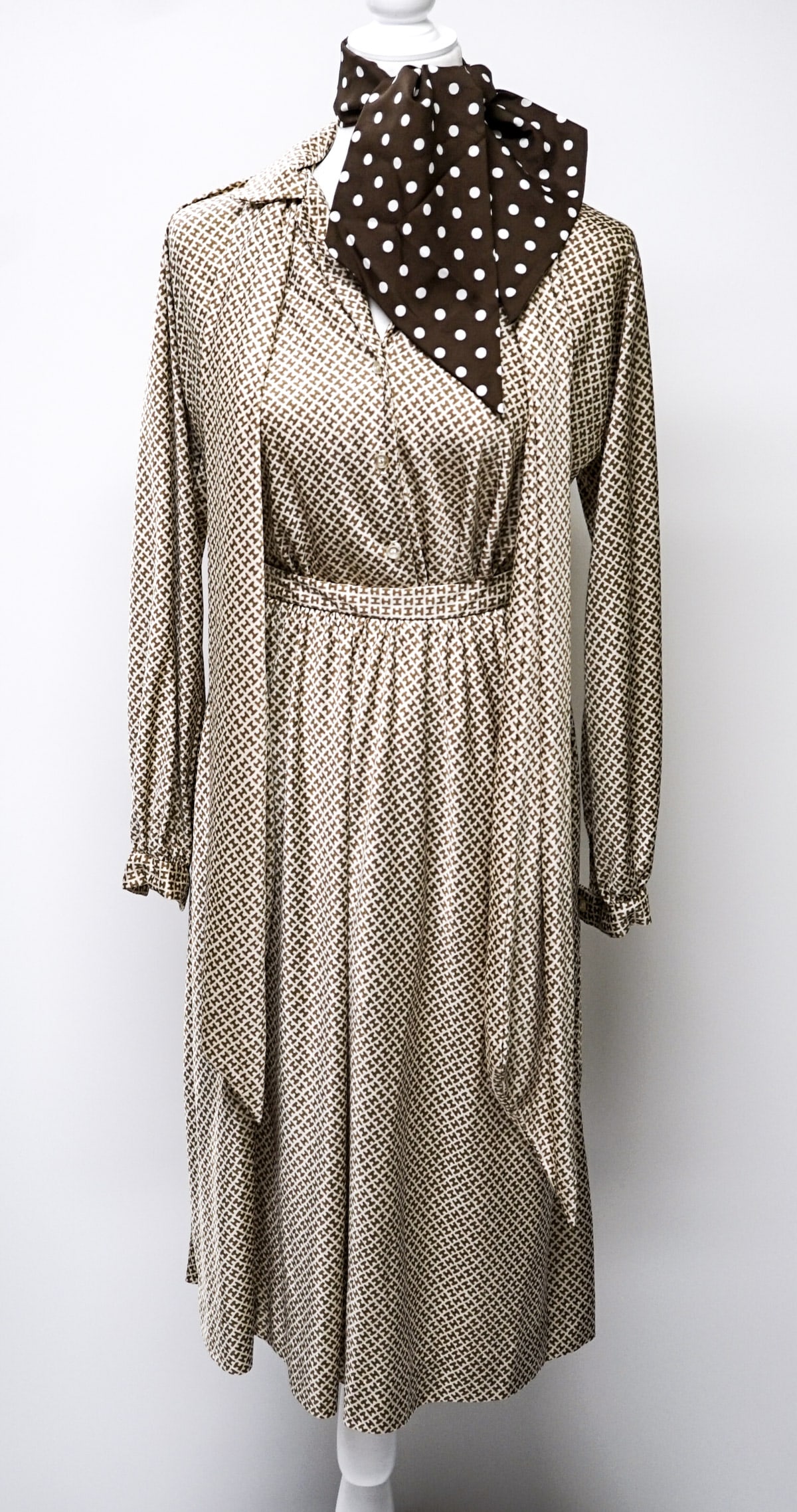 Braniff Airways - Halston Hostess Uniform: Braniff International Airways Halston Hostess uniform pieces include: Button blouse measures 20 in. across chest measured from underarm x 29 in. tong measured from the back collar x 18 in. sleeve leng