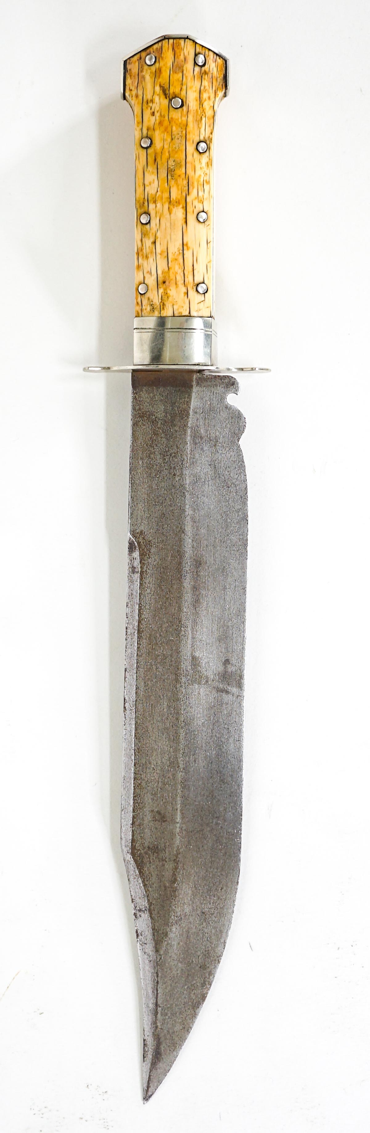 Bowie Knife. High End Unsigned 15 IN: Bowie Knife. High End Unsigned 15 Inches Length with Bone or Stag Handle. Measures 15 in. H x 2.5 in. W x 1 in. D. The absence of a condition report does not imply that the lot is in perfect condition