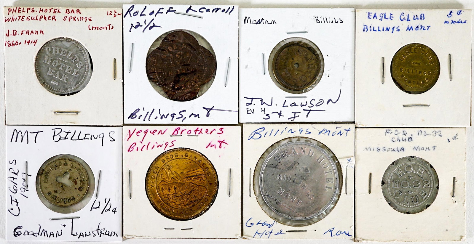 Montana (8) Trade Tokens: Eight (8) Montana trade tokens. Billings, Missoula, White Sulphur Springs. Lot measures 2 in. H x 2 in. W x .875 in. D. The absence of a condition report does not imply that the lot is in perfect cond