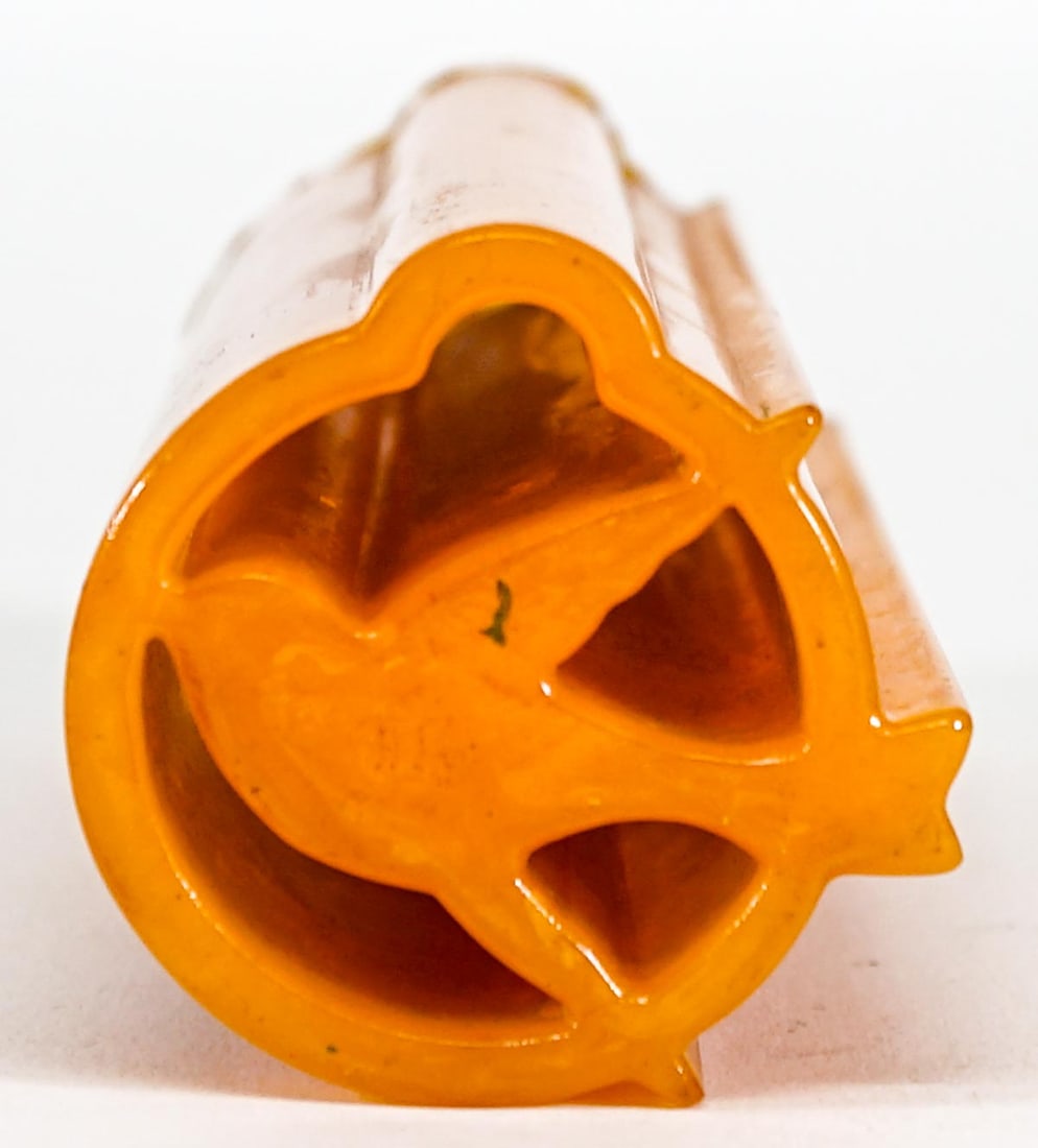 Extruded Bakelite Uncut Rod (Bird, 6 inches): Extruded Bakelite Uncut Rod (Bird, 6 inches length). Measures 6 in. x 2.25 in. x 2.25 in. Weighs 298 grams. The descriptions of items appearing in advertising prior to this auction are believed to be