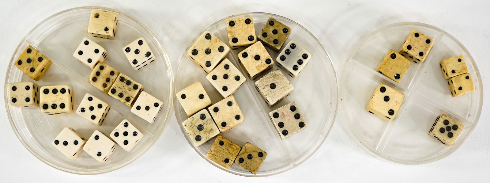 Vintage & Antique Bone Dice: Dice in this lot measure .375-.625 inches. The group measures 7 x 5 x 1.5 inches. The descriptions of items appearing in advertising prior to this auction are believed to be correct, nevertheless, nei