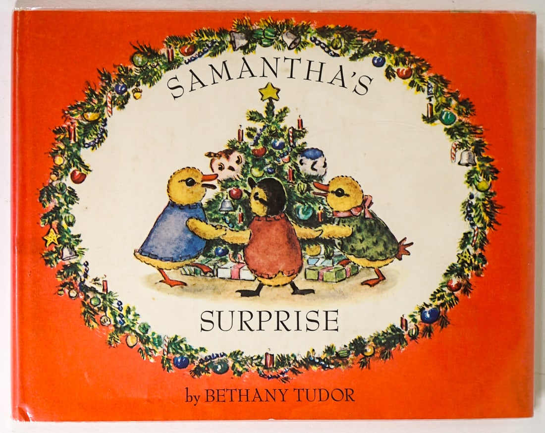 Samantha's Surprise by Bethany Tudor SIGNED: Samantha's Surprise by Bethany Tudor. Inscribed, signed with drawing by Tasha Tudor opposite title page. 1964 with clipped dust jacket. JB Lippincott. Unpaginated. Red covers, tape residue on jacket a