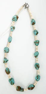Turquoise Copper-Tone / Beaded 18IN Necklace: Vintage turquoise copper-tone beaded 18IN necklace. Fifteen(15) turquoise copper-tone pieces measure approximately 12mm to 19mm. Necklace measures 5 in. H x 5 in. W x 1 in. D for shipping purposes onl